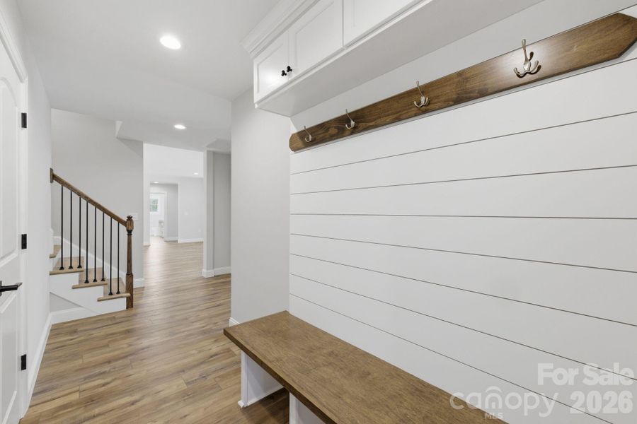 A stylish white shiplap-accented drop zone  designed for organization & functionality