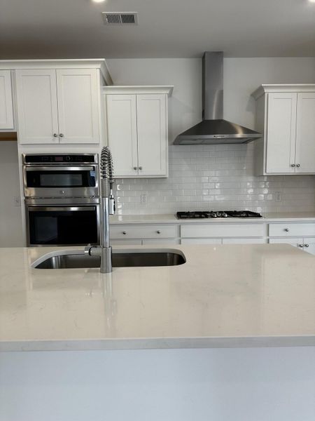 Furnished interior view inside a new home in Horizons at Carnes Crossroads | 55+: Legends Collection, Summerville (Image 4). Furnished interior view inside a new home in Horizons at Carnes Crossroads | 55+: Legends Collection, Summerville (Image 4).