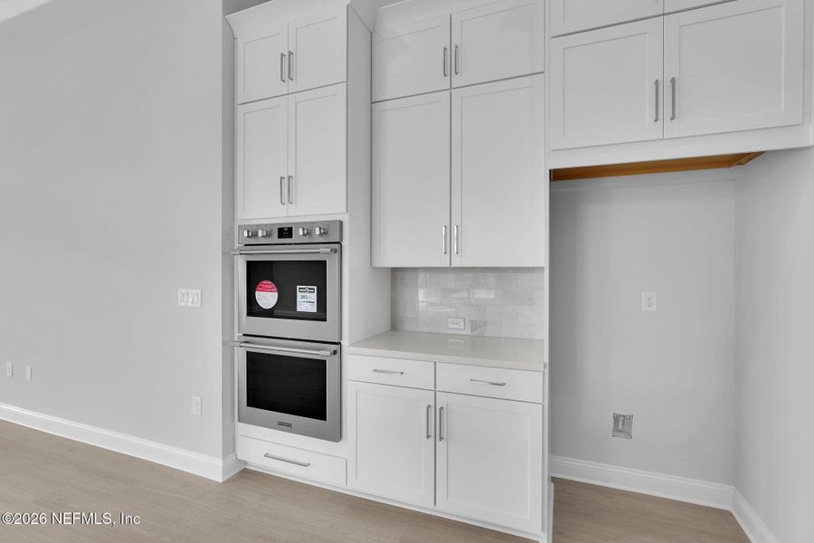Furnished interior view inside a new home in Amelia National Country Club, Fernandina Beach (Image 11).