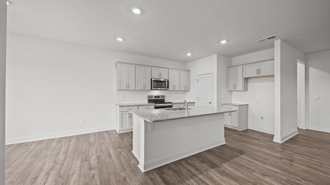 Furnished interior view inside a new home in Dail Farm, Farmville (Image 6).