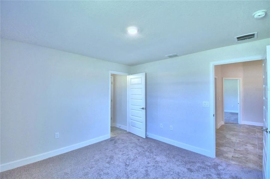 Spacious, unfurnished interior of a new home in Cadence Crossing, Auburndale (Image 29).