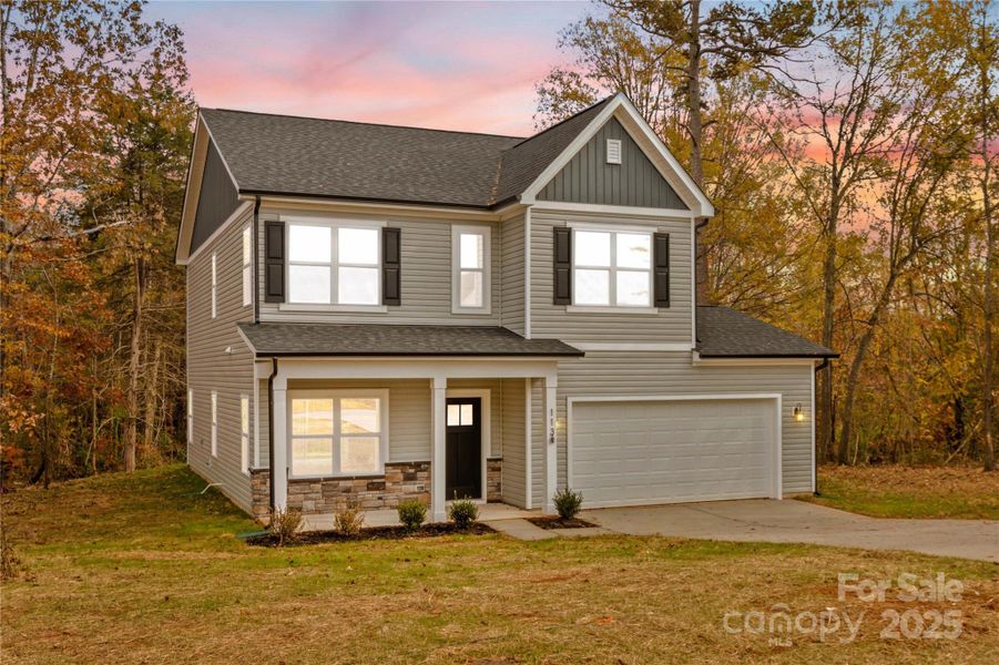 Front exterior of a new home in , Statesville, NC, highlighting curb appeal (Image 2).