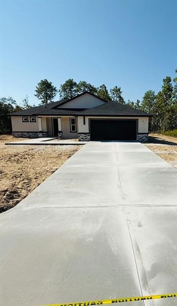 Front exterior of a new home in , Brooksville, FL, highlighting curb appeal (Image 18).