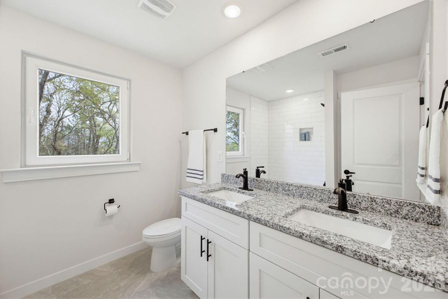 Furnished interior view inside a new home in , Hickory (Image 15).