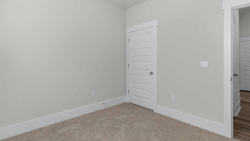 Spacious, unfurnished interior of a new home in Surfside Landing, Hubert (Image 19).