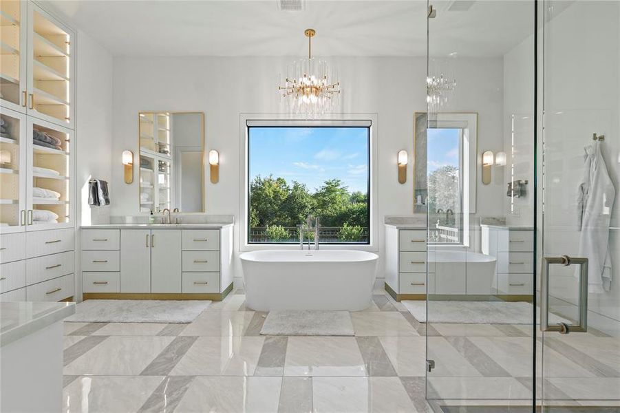 Bathroom with vanity, a freestanding tub, and a shower stall Bathroom with vanity, a freestanding tub, and a shower stall