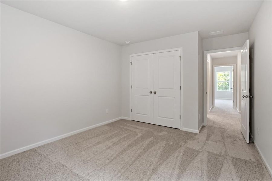Spacious, unfurnished interior of a new home in Cambridge Reserve, Angier (Image 33).