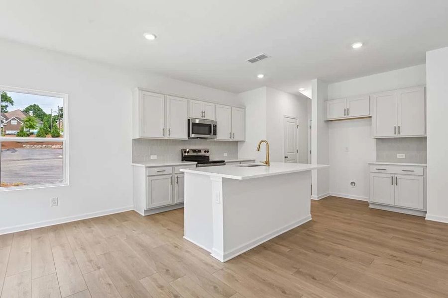 Representative Photo: Kitchen featuring Serene Collection Finishes