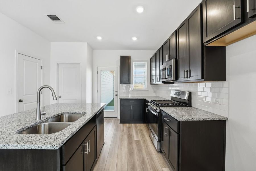 Furnished interior view inside a new home in Longview, Del Valle (Image 7).