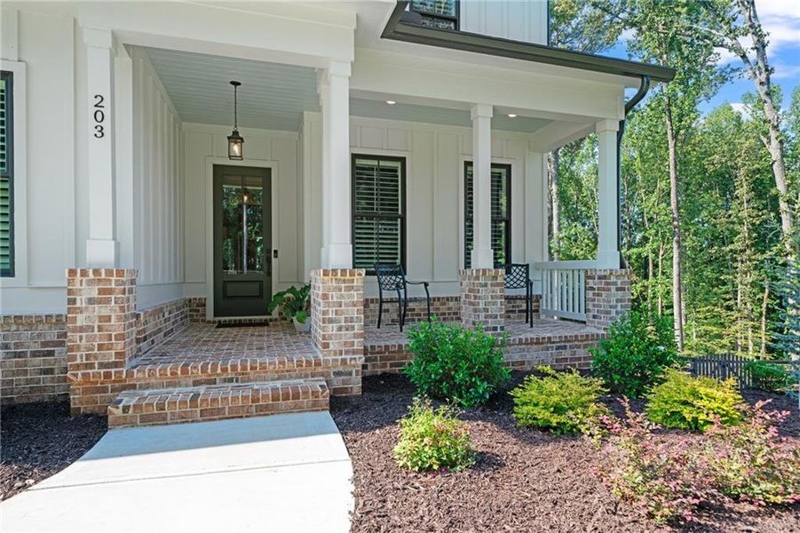 Front exterior of a new home in , Woodstock, GA, highlighting curb appeal (Image 2). Front exterior of a new home in , Woodstock, GA, highlighting curb appeal (Image 2).
