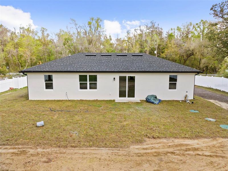 Exterior details and patio area of a home in , Brooksville (Image 24).