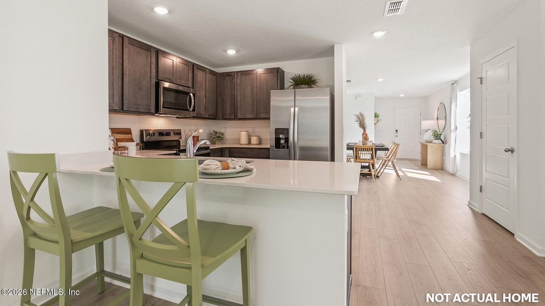Furnished interior view inside a new home in Rookery, Green Cove Springs (Image 19).