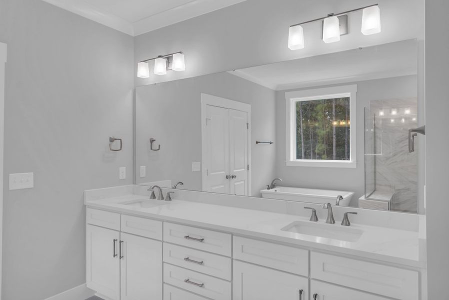 Representative furnished interior of a home built from the The Hampton by RobuckHomes in Stonehenge, Raleigh (Image 14).