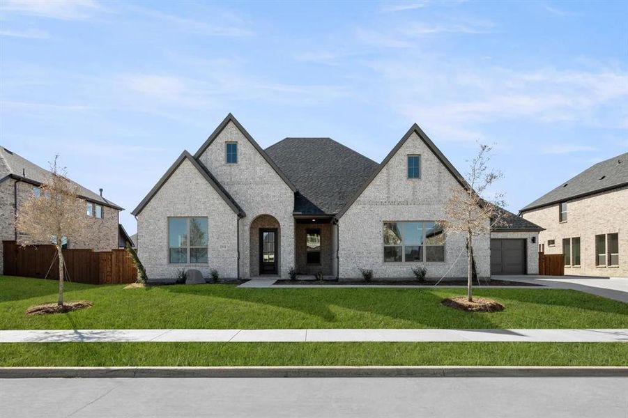 Front exterior of a new home in Rockwood 90', Mansfield, TX, highlighting curb appeal (Image 2).