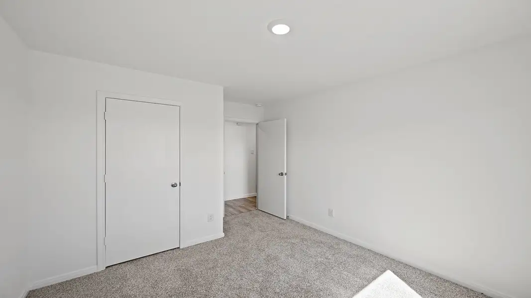 Spacious, unfurnished interior of a new home in McCrorey Trails, Conroe (Image 10).