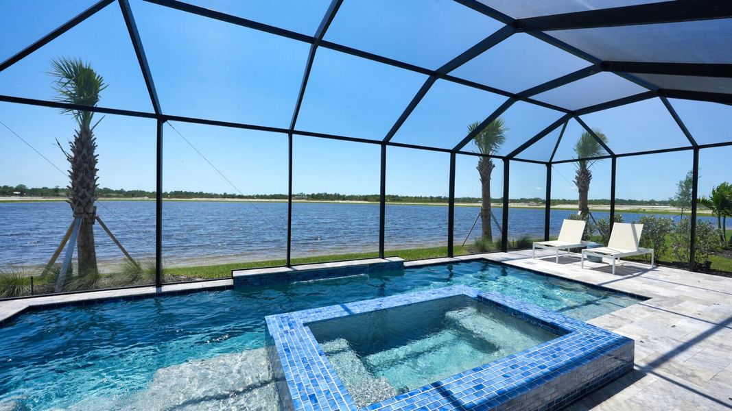 Exterior details and patio area of a home in SkySail, Naples (Image 24).