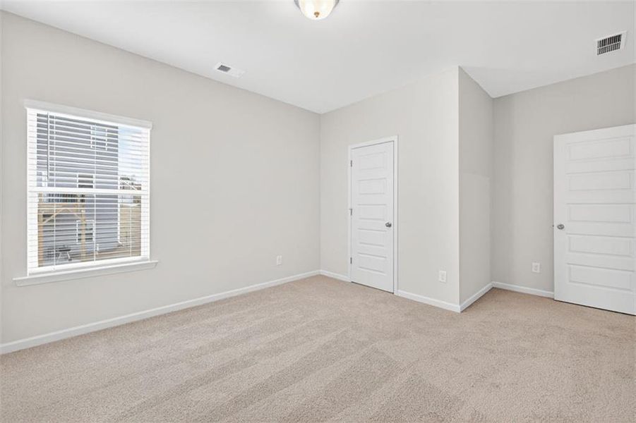 Spacious, unfurnished interior of a new home in Garrett Preserve, Douglasville (Image 32).