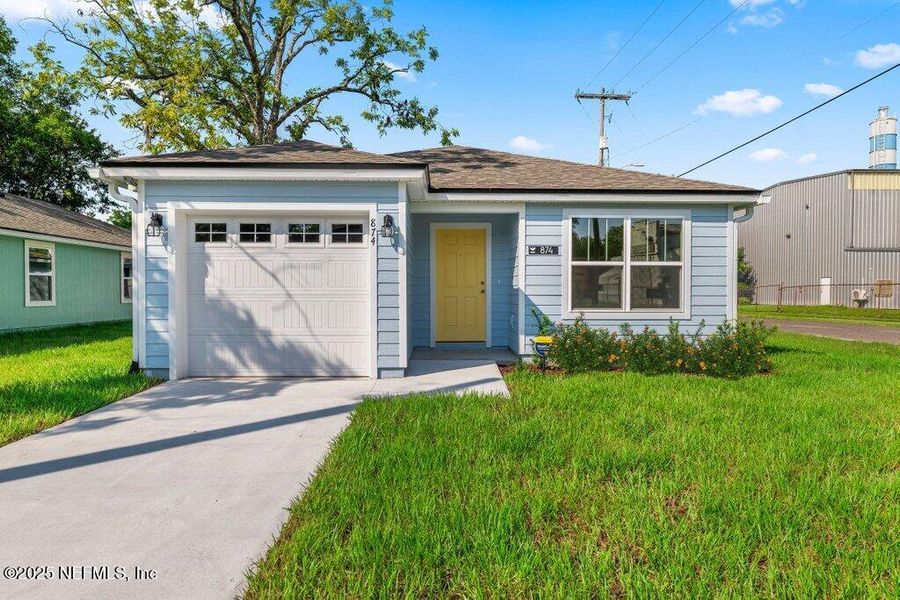 Front exterior of a new home in , Jacksonville, FL, highlighting curb appeal (Image 2).