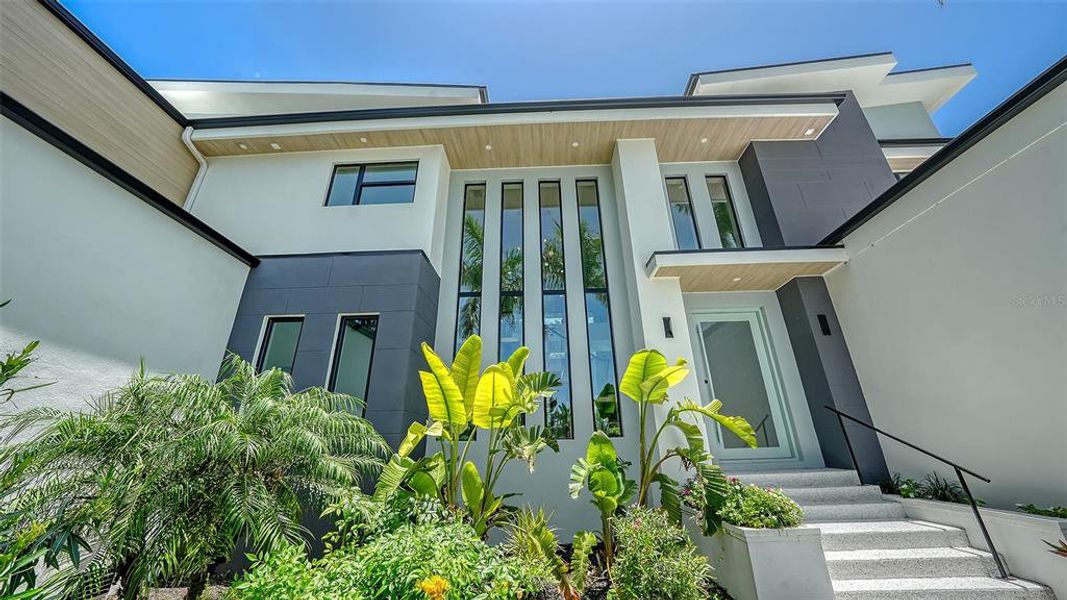 Front exterior of a new home in , Sarasota, FL, highlighting curb appeal (Image 25).