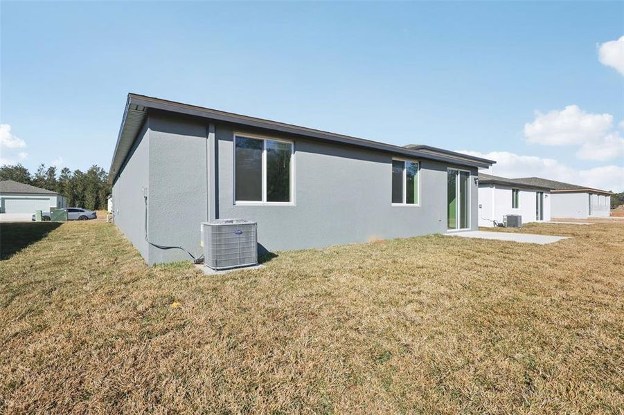 Exterior details and patio area of a home in Leyland Preserve - Classic Series, Brooksville (Image 4).