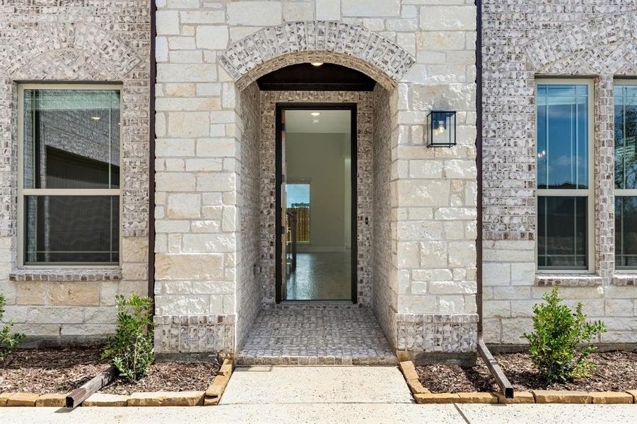 Exterior details and patio area of a home in Wildflower Ranch 60-65, Justin (Image 22). Exterior details and patio area of a home in Wildflower Ranch 60-65, Justin (Image 22).
