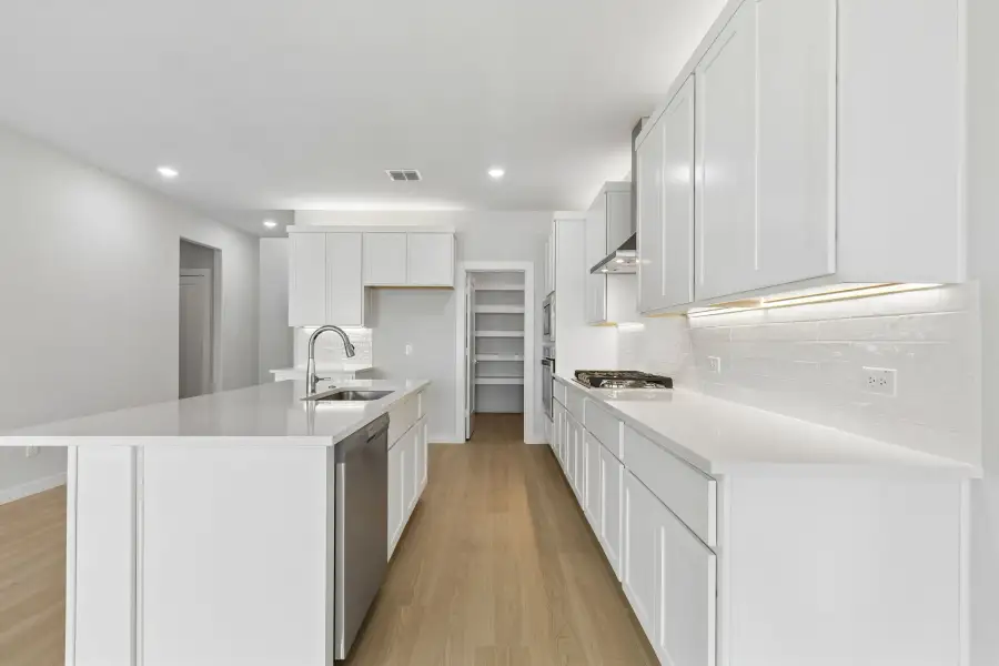 Kitchen in the Winters home plan by Trophy Signature Homes – REPRESENTATIVE PHOTO