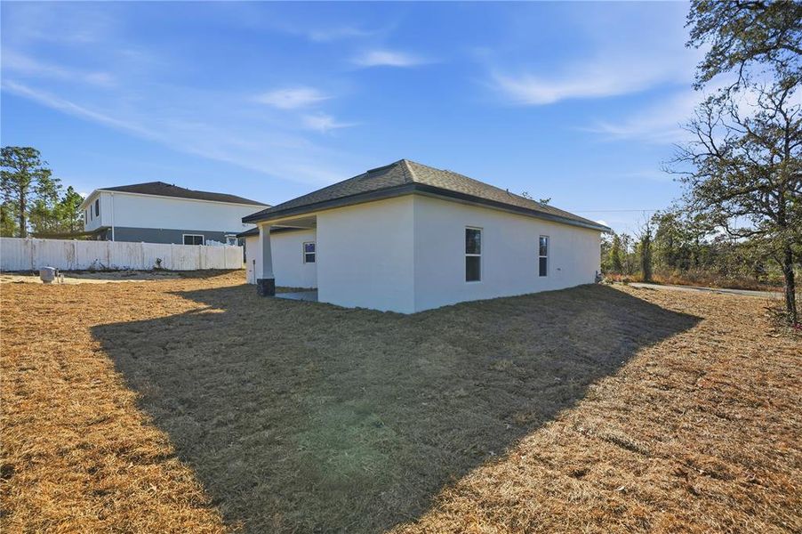 Exterior details and patio area of a home in , Brooksville (Image 27).