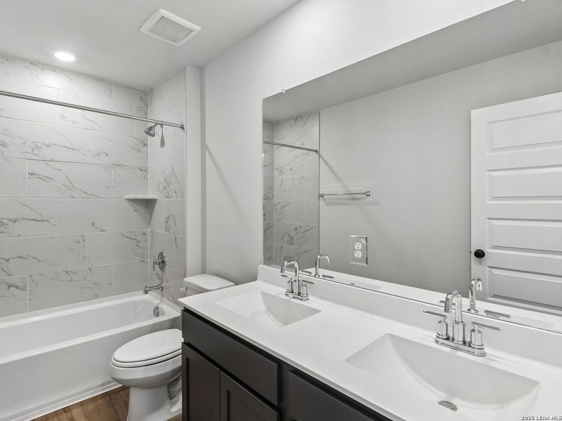 Furnished interior view inside a new home in Fairway Crossing, Converse (Image 7).