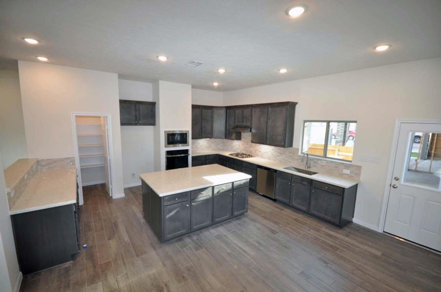 Furnished interior view inside a new home in Pedregal, League City (Image 6).