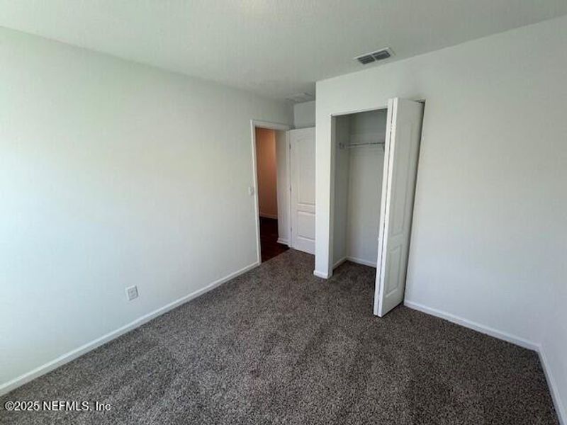 Spacious, unfurnished interior of a new home in Sawmill Branch Express, Palm Coast (Image 33).