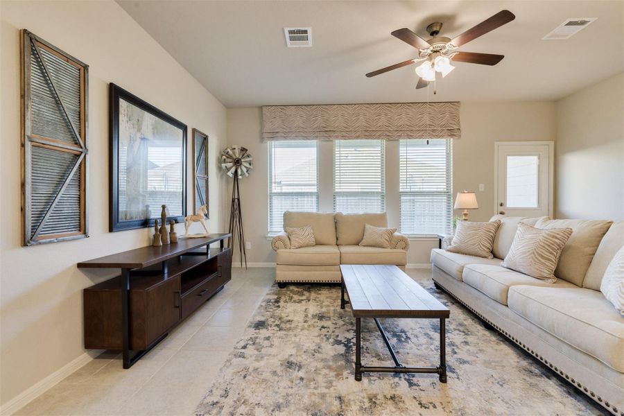 Furnished interior view inside a new home in Sunterra, Katy (Image 24).