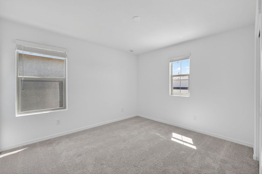 Spacious, unfurnished interior of a new home in Artisan at Asante, Surprise (Image 23).
