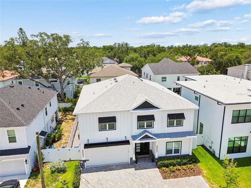 Front exterior of a new home in , Tampa, FL, highlighting curb appeal (Image 21).