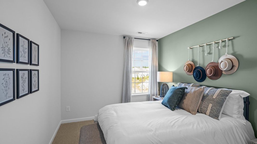 Furnished interior view inside a new home in The Townes at Ridgewood Farms, Winterville (Image 24).