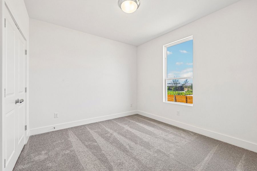 Spacious, unfurnished interior of a new home in Freedom at Anthem, Kyle (Image 17).