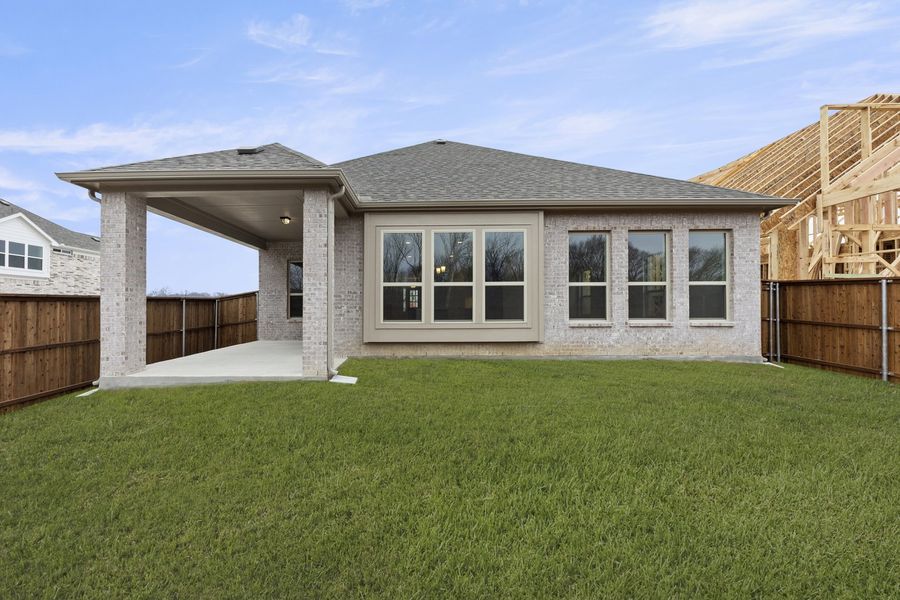 Exterior details and patio area of a home in Providence Cove, McKinney (Image 4). Exterior details and patio area of a home in Providence Cove, McKinney (Image 4).