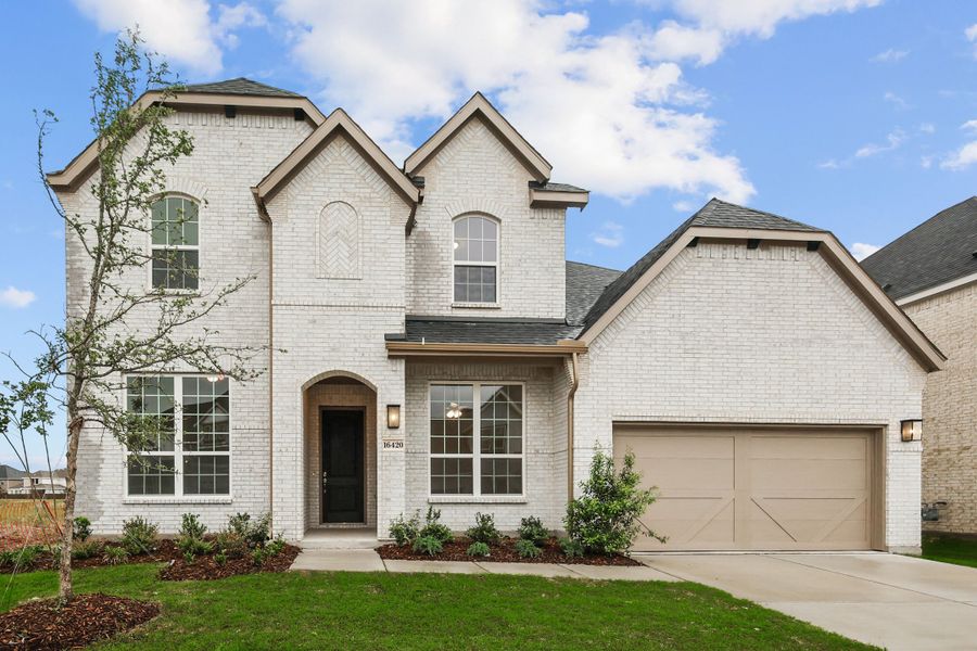 Representative exterior photo of a completed home built from the Classic Series - Dartmouth by DRB Homes in Oaks at San Gabriel, Georgetown, TX (Image 25).
