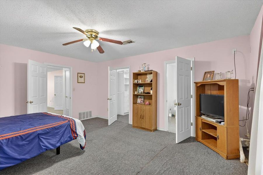 Spacious bedroom with walk in closet and ensuite bathroom