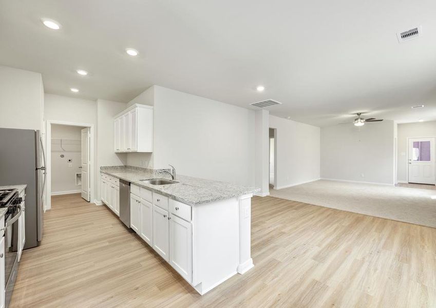 Enjoy family meals in this spacious dining room.