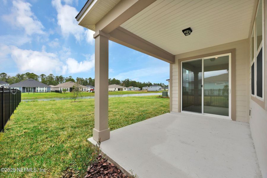 Exterior details and patio area of a home in Hyland Trail, Green Cove Springs (Image 3).