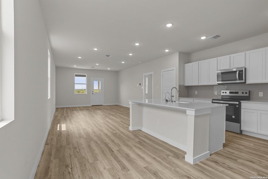 Furnished interior view inside a new home in Hacienda, San Antonio (Image 6).