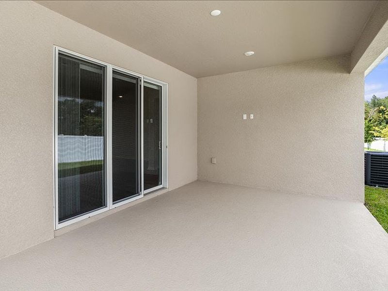 Enjoy outdoor living on your large covered lanai.