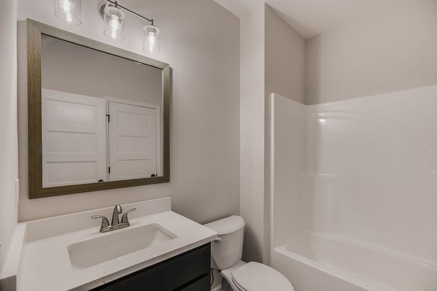 Furnished interior view inside a new home in Parmer Farms, Roopville (Image 9).