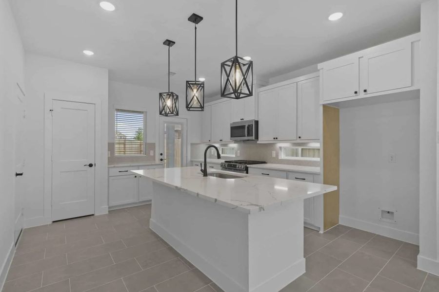 Furnished interior view inside a new home in Elyson Courtyard Collection, Katy (Image 4).