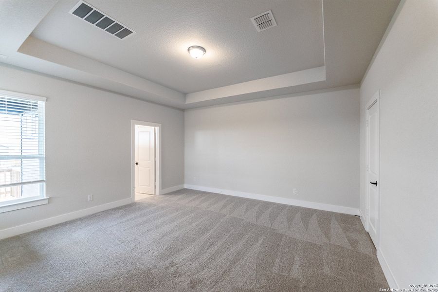 Spacious, unfurnished interior of a new home in The Woodlands at Medina Hills, Mico (Image 12).