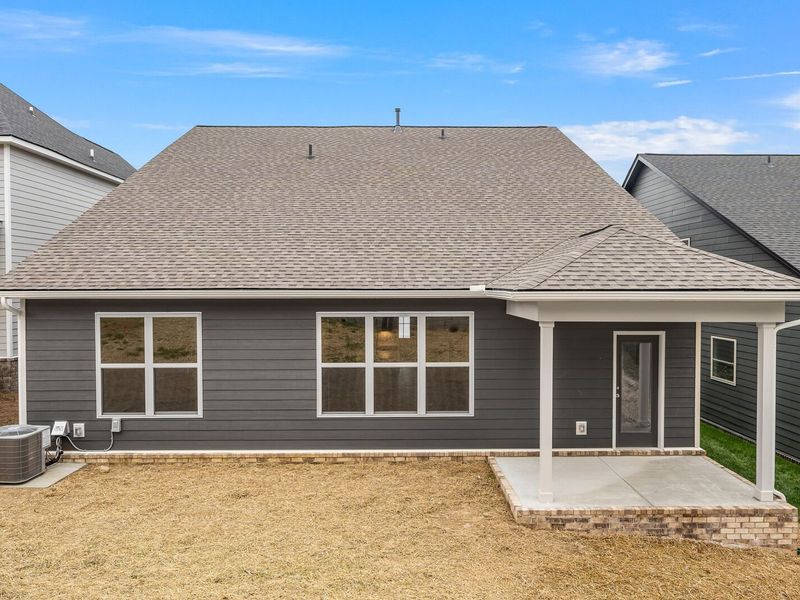 Exterior details and patio area of a home in Woods Crossing, Gallatin (Image 31).