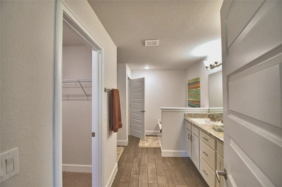 Furnished interior view inside a new home in Magnolia Park, Haines City (Image 30).