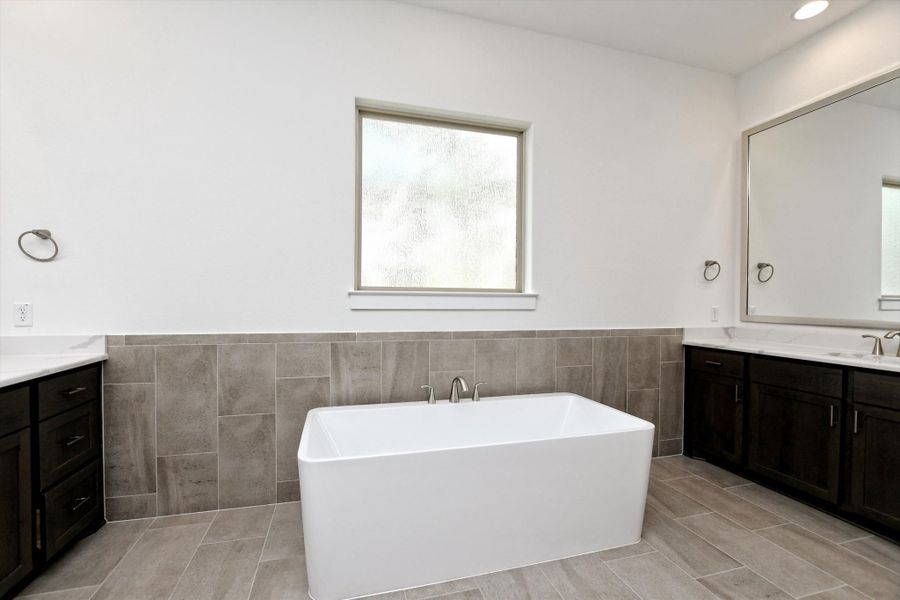 Furnished interior view inside a new home in The Hollows, Jonestown (Image 15).