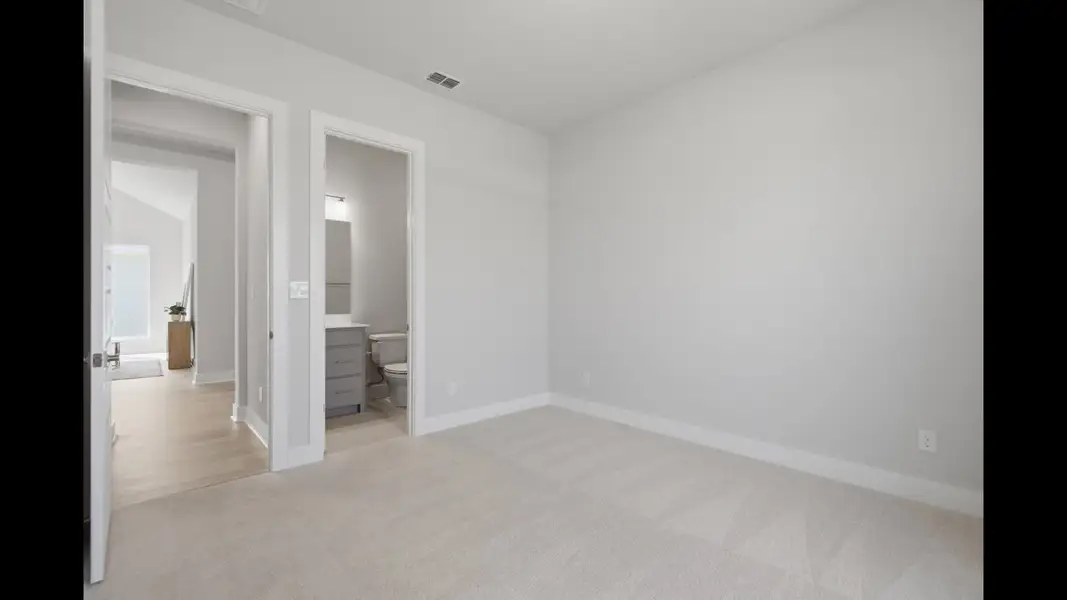 Representative unfurnished interior of a home built from the 2546F by Perry Homes in Sanctuary at Seaire, Parrish (Image 15).