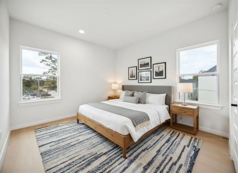 Secondary bedroom on the third floor that can also be a gameroom. *Virtually staged*